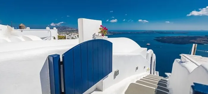 Framed Print : Santorini, Greece landscape, pool caldera view with flowers blue doors. Romantic couple destination with sunny sky, wonderful summer hotel resort Framed Print : Santorini, Greece landscape, pool caldera view with flowers blue doors. Romantic couple destination with sunny sky, wonderful summer hotel resort