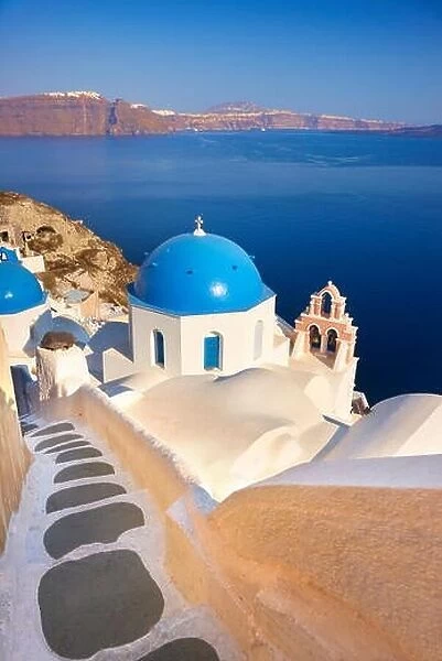 Santorini - greek white church and Aegean Sea in the background, Oia Town, Santorini Island, Greece