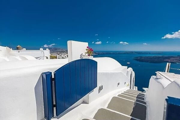 Santorini Island, Greece. Amazing travel landscape, stunning scenery with blue door and white architecture over blue sea bay. Perfect summer vacation