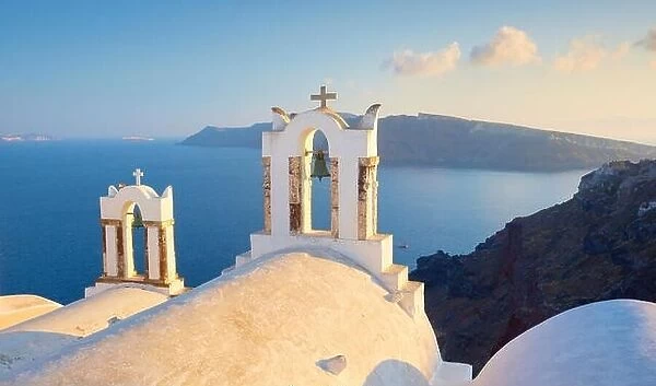 Santorini landscape with two bell towers overlooking the sea, Oia Town, Santorini Island, Greece