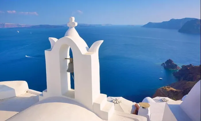 Framed Print : Santorini - landscape with white greek bell tower and sea in the background - Oia Town, Cyclades, Greece Framed Print : Santorini - landscape with white greek bell tower and sea in the background - Oia Town, Cyclades, Greece