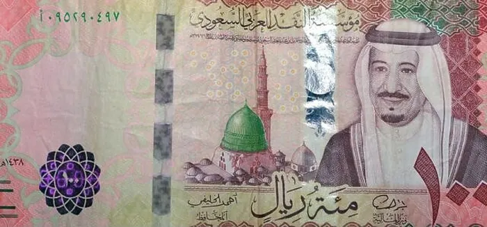 Framed Print : Saudi Arabia 100 riyal banknote, The Saudi riyal is the currency of Saudi Arabia, selective focus of Saudi kingdom cash money Framed Print : Saudi Arabia 100 riyal banknote, The Saudi riyal is the currency of Saudi Arabia, selective focus of Saudi kingdom cash money