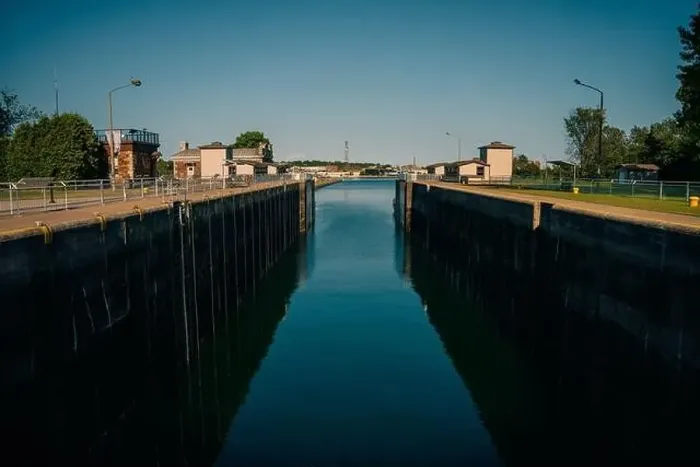 Framed Print : Sault Ste. Marie, ON, Canada-June 30, 2022 Historical building on the waterfront of the Soo Locks.. High quality photo Framed Print : Sault Ste. Marie, ON, Canada-June 30, 2022 Historical building on the waterfront of the Soo Locks.. High quality photo