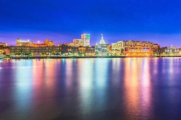 Savannah, Georgia, USA skyline on the Savannah River at dusk