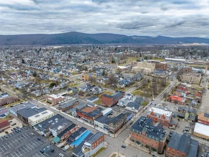 Framed Print : Sayre, PA, USA - 03-03-2024 - Cloudy winter aerial image of the downtown area in the City of Sayre, PA Framed Print : Sayre, PA, USA - 03-03-2024 - Cloudy winter aerial image of the downtown area in the City of Sayre, PA