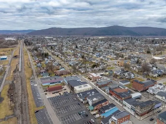 Framed Print : Sayre, PA, USA - 03-03-2024 - Cloudy winter aerial image of the downtown area in the City of Sayre, PA Framed Print : Sayre, PA, USA - 03-03-2024 - Cloudy winter aerial image of the downtown area in the City of Sayre, PA