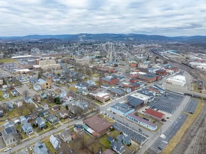 Framed Print : Sayre, PA, USA - 03-03-2024 - Cloudy winter aerial image of the downtown area in the City of Sayre, PA Framed Print : Sayre, PA, USA - 03-03-2024 - Cloudy winter aerial image of the downtown area in the City of Sayre, PA