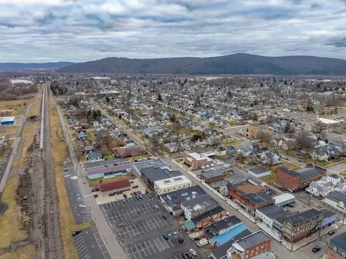 Framed Print : Sayre, PA, USA - 03-03-2024 - Cloudy winter aerial image of the downtown area in the City of Sayre, PA Framed Print : Sayre, PA, USA - 03-03-2024 - Cloudy winter aerial image of the downtown area in the City of Sayre, PA