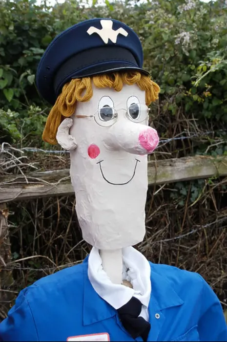 Framed Print : Scarecrow looking like Postman Pat Framed Print : Scarecrow looking like Postman Pat