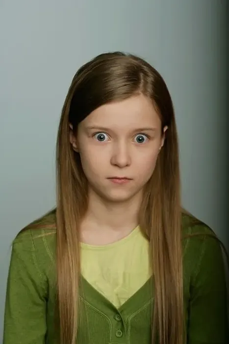 Framed Print : Scared girl looking at camera Framed Print : Scared girl looking at camera