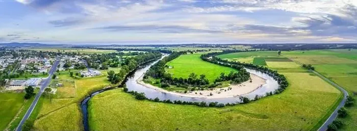 Framed Print : Scenic aerial panorama of beautiful river and green pastures in Australia Framed Print : Scenic aerial panorama of beautiful river and green pastures in Australia