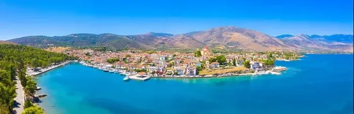 Framed Print : Scenic aerial view of Galaxidi village with colorful buildings, Greece Framed Print : Scenic aerial view of Galaxidi village with colorful buildings, Greece