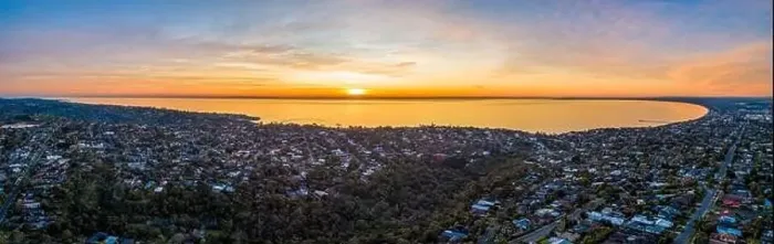 Framed Print : Scenic aerial view of Port Phillip Bay at sunset surrounded by residential area. Melbourne, Australia Framed Print : Scenic aerial view of Port Phillip Bay at sunset surrounded by residential area. Melbourne, Australia