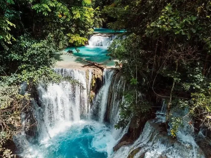 Framed Print : Scenic cascade waterfall with natural blue water in Central Sulawesi, drone view Framed Print : Scenic cascade waterfall with natural blue water in Central Sulawesi, drone view