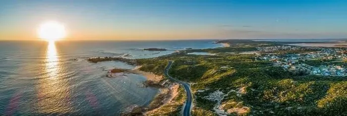 Framed Print : Scenic drive passing near ocean coastline and Beachport town at sunset - wide aerial panorama Framed Print : Scenic drive passing near ocean coastline and Beachport town at sunset - wide aerial panorama