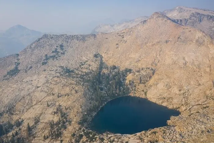 Framed Print : A scenic lake is found amid the wilderness of the Sierra Nevada Mountains. These beautiful granite mountains run along the eastern edge of California Framed Print : A scenic lake is found amid the wilderness of the Sierra Nevada Mountains. These beautiful granite mountains run along the eastern edge of California