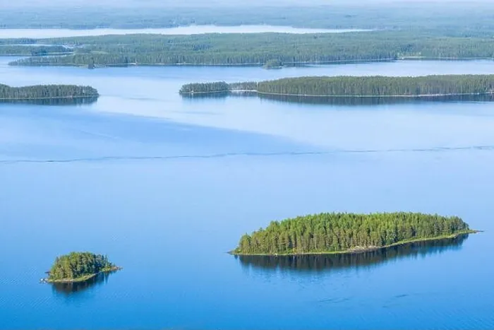 Framed Print : Scenic lake landscape with blue water and beautiful pine trees island at sunny summer day in National park Finland Framed Print : Scenic lake landscape with blue water and beautiful pine trees island at sunny summer day in National park Finland