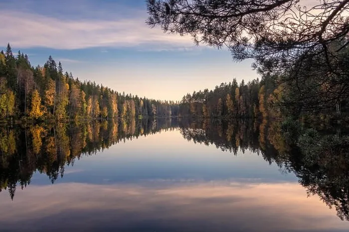 Framed Print : Scenic lake landscape with reflections and calm weather at autumn evening in Finland Framed Print : Scenic lake landscape with reflections and calm weather at autumn evening in Finland