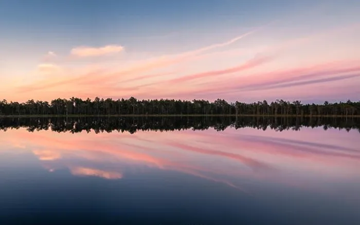 Framed Print : Scenic lake view with reflections and sunset at peaceful evening in National Park Finland Framed Print : Scenic lake view with reflections and sunset at peaceful evening in National Park Finland