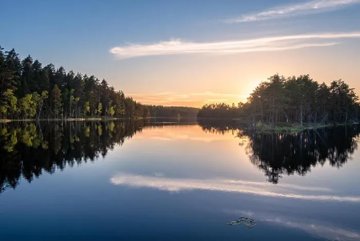 Framed Print : Scenic lake view with reflections and sunset at peaceful evening in National Park Finland Framed Print : Scenic lake view with reflections and sunset at peaceful evening in National Park Finland