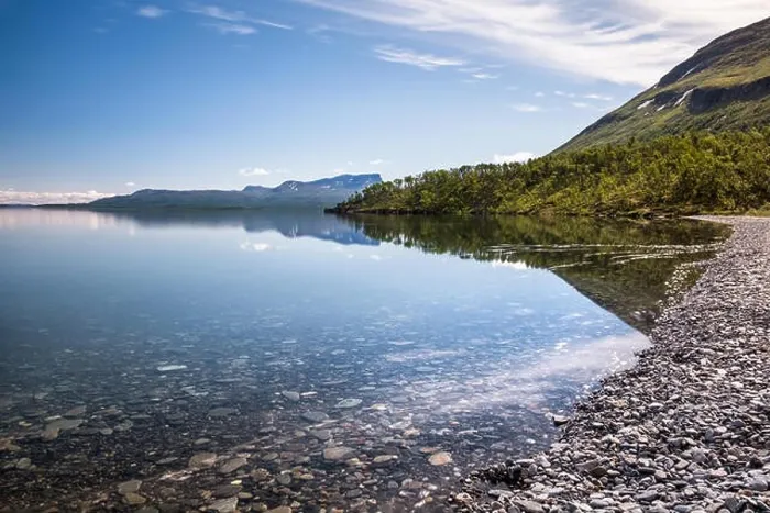 Framed Print : Scenic lake view with tranquil water at sunny summer day in Abisko, Sweden Framed Print : Scenic lake view with tranquil water at sunny summer day in Abisko, Sweden