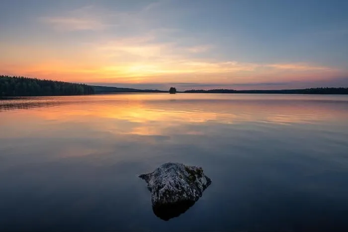 Framed Print : Scenic landscape with beautiful sunset and lake at summer evening in Finland Framed Print : Scenic landscape with beautiful sunset and lake at summer evening in Finland