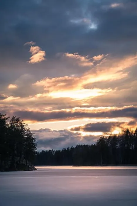 Framed Print : Scenic landscape with dramatic sky and sunset at evening in Finland Framed Print : Scenic landscape with dramatic sky and sunset at evening in Finland