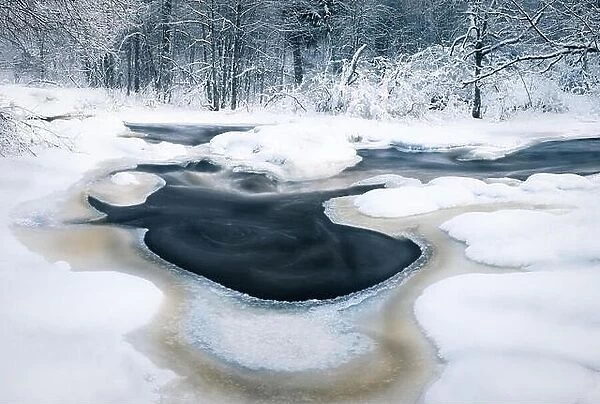Scenic landscape with flowing river at winter morning