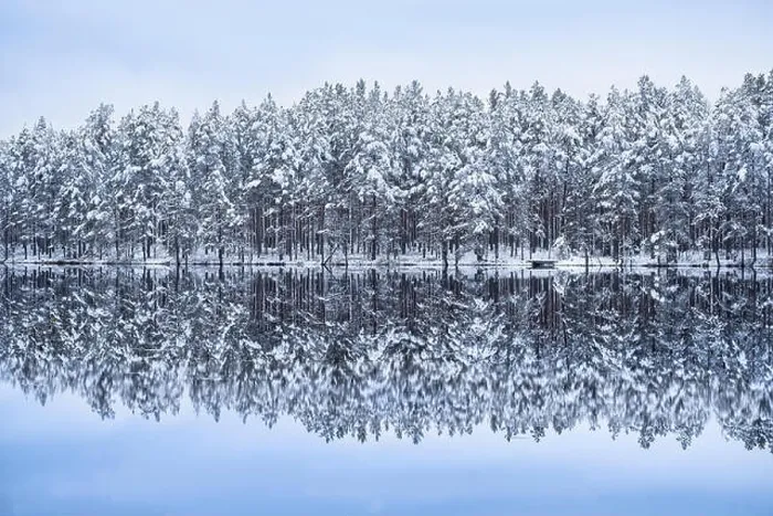 Framed Print : Scenic landscape with lake reflection and snow at winter evening Framed Print : Scenic landscape with lake reflection and snow at winter evening