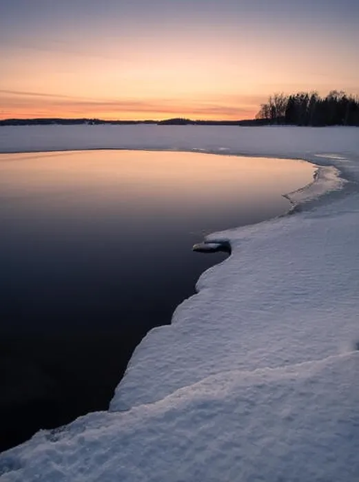 Framed Print : Scenic landscape with melted lake an sunset at evening in Finland Framed Print : Scenic landscape with melted lake an sunset at evening in Finland