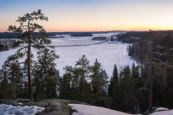 Scenic landscape with sunrise at top of the hill in Finland