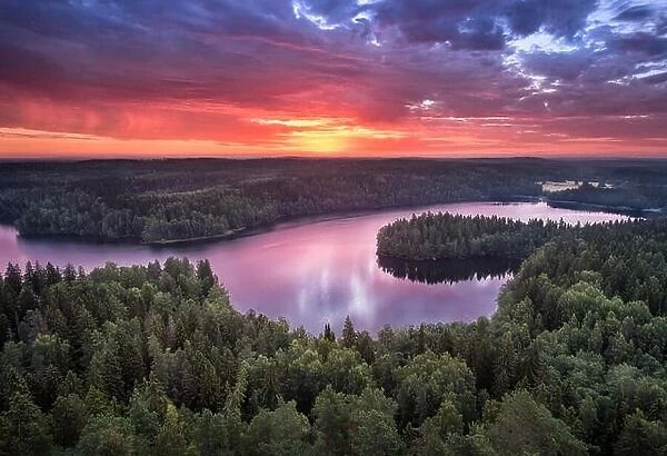 Scenic landscape with sunrise and lake at summer in national park Aulanko, Hämeenlinna, Finland