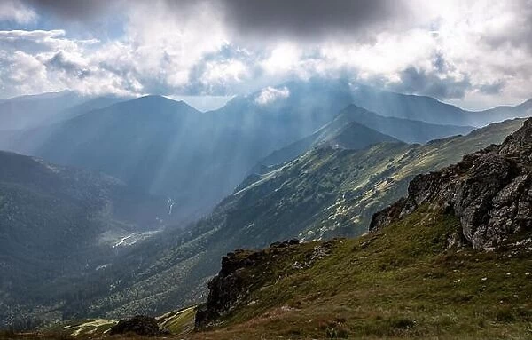 Scenic mountain view with beams of light at summer day in National park of Tatra mountains