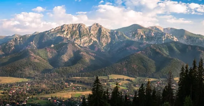 Framed Print : Scenic panorama landscape from Tatra mountains at summer evening in Zakonpane, Poland Framed Print : Scenic panorama landscape from Tatra mountains at summer evening in Zakonpane, Poland