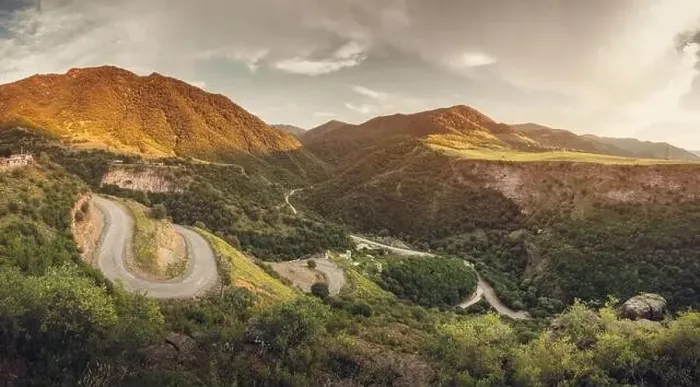 Framed Print : Scenic panoramic view over the serpentine mountain road near deep canyon in Haghpat Framed Print : Scenic panoramic view over the serpentine mountain road near deep canyon in Haghpat