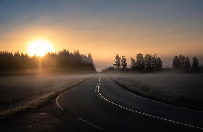 Framed Print : Scenic road landscape with sunrise and fog at autumn morning in Finland Framed Print : Scenic road landscape with sunrise and fog at autumn morning in Finland