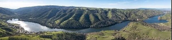 Scenic rolling hills and valleys surround a reservoir in the Tri-valley area of Northern California, just east of San Francisco Bay