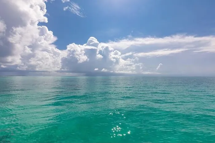 Framed Print : Scenic summer view of the blue tropical sea or ocean resort and sky with clouds. Beautiful ocean beach Framed Print : Scenic summer view of the blue tropical sea or ocean resort and sky with clouds. Beautiful ocean beach