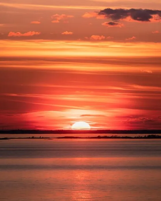 Framed Print : Scenic sunset with empty sea and colorful sky at evening in Finland Framed Print : Scenic sunset with empty sea and colorful sky at evening in Finland