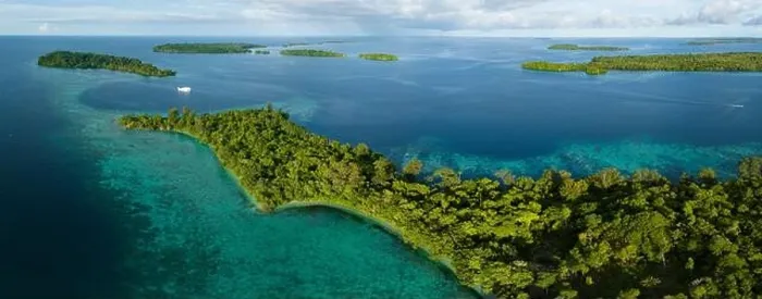Framed Print : A scenic tropical island is fringed by a healthy coral reef in the Solomon Islands. This beautiful country is home to spectacular marine biodiversity Framed Print : A scenic tropical island is fringed by a healthy coral reef in the Solomon Islands. This beautiful country is home to spectacular marine biodiversity
