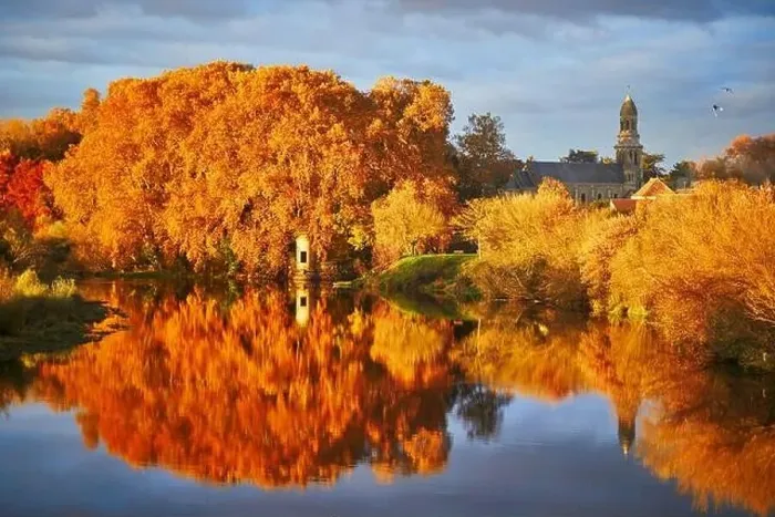 Framed Print : Scenic view of autumn forest and river Vienne near medieval castle of Les Ormes, France Framed Print : Scenic view of autumn forest and river Vienne near medieval castle of Les Ormes, France