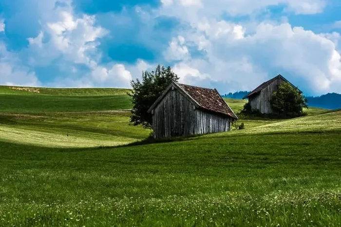 Framed Print : Scenic view over the German countryside around the village Kappel with two old wooden sheds over the green hills Framed Print : Scenic view over the German countryside around the village Kappel with two old wooden sheds over the green hills