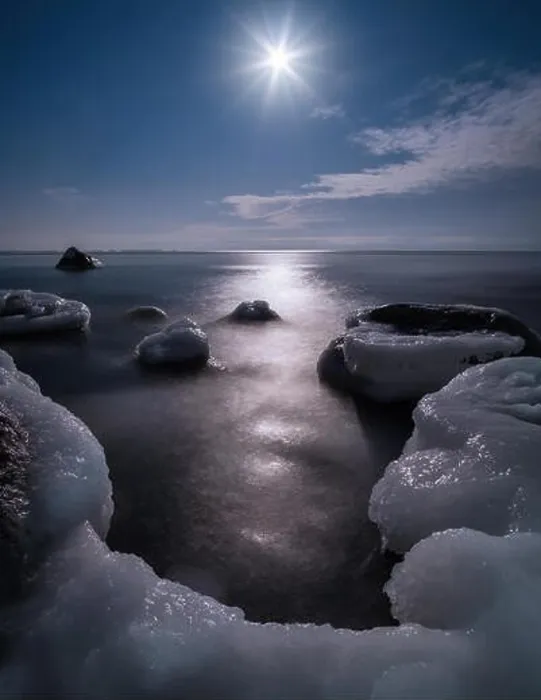 Framed Print : Scenic view with moonlight and icy sea at winter night in coastline, Finland Framed Print : Scenic view with moonlight and icy sea at winter night in coastline, Finland