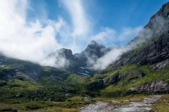 Framed Print : Scenic view from mountain peak at bright summer day in Lofoten, Norway Framed Print : Scenic view from mountain peak at bright summer day in Lofoten, Norway