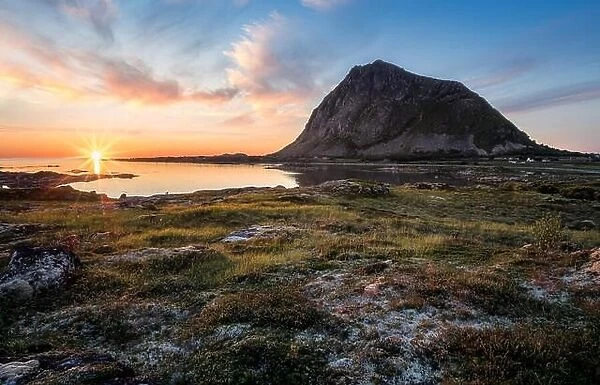 Scenic view with sunset and mountain at summer night in Lofoten, Norway