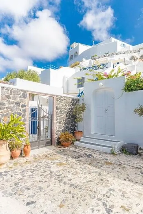 Framed Print : Scenic view of traditional cycladic Santorini houses on small street, old stone path, white architecture and blue sky. Summer travel vacation, idyllic Framed Print : Scenic view of traditional cycladic Santorini houses on small street, old stone path, white architecture and blue sky. Summer travel vacation, idyllic