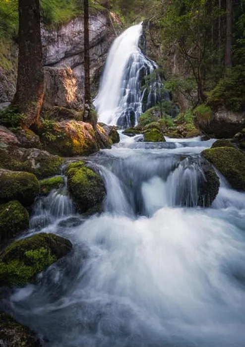 Framed Print : Scenic waterfall landscape with green moos stones and flowing river at beautiful summer day in Gollinger, Austria Framed Print : Scenic waterfall landscape with green moos stones and flowing river at beautiful summer day in Gollinger, Austria