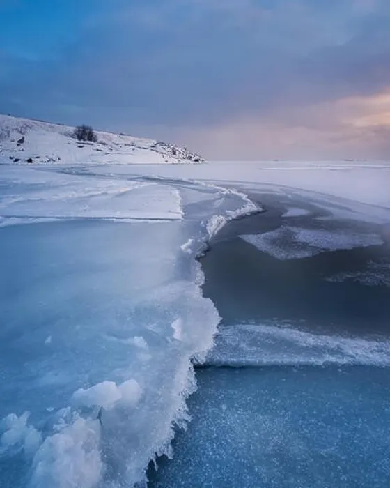 Framed Print : Scenic winter landscape with frosty sea and sunset at evening in Helsinki, Finland Framed Print : Scenic winter landscape with frosty sea and sunset at evening in Helsinki, Finland