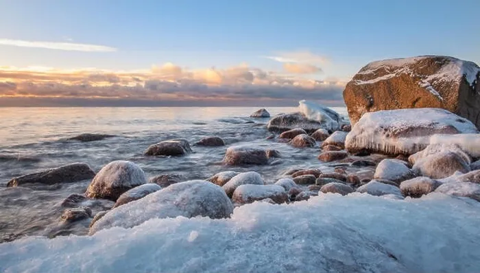Framed Print : Scenic winter landscape with sea and sunrise at morning. Beautiful light with rocky coast in Finland Framed Print : Scenic winter landscape with sea and sunrise at morning. Beautiful light with rocky coast in Finland