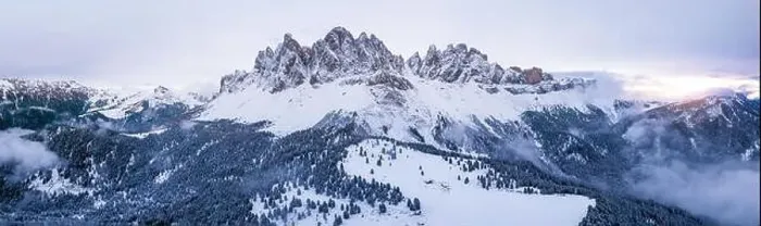 Framed Print : Scenic winter mountain landscape in Alps with aerial panoramic view of Geisler Peaks from Adolf Munkel trail in Zanser Framed Print : Scenic winter mountain landscape in Alps with aerial panoramic view of Geisler Peaks from Adolf Munkel trail in Zanser